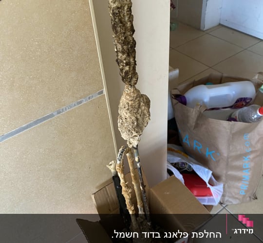 אבנית מצטברת על גוף חימום של דוד שמש